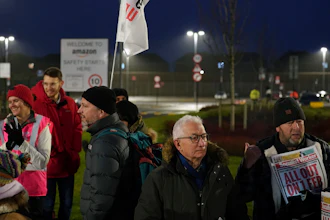 Members of the GMB union on the picket line outside the Amazon fulfillment centre, Coventry, England, Jan. 25, 2023.