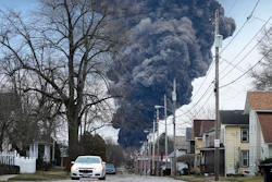 A black plume rises over East Palestine, Ohio, after a controlled detonation of derailed Norfolk Southern trains, Feb. 6, 2023.