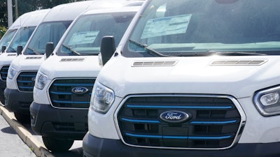 Ford E-Transit electric vans displayed at Gus Machado Ford, Hialeah, Fla., Jan. 23, 2023.