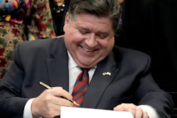 Illinois Gov. J.B. Pritzker sign the Paid Leave For All Workers Act, Chicago, March 13, 2023.