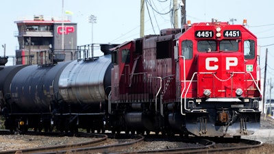 Canadian Pacific trains sit idle on the tracks due to a strike at the main CP Rail train yard in Toronto, March 21, 2022. The first major railroad merger since the 1990s could be approved Wednesday, March 15, 2023, when federal regulators announce their decision on Canadian Pacific's $31 billion acquisition of Kansas City Southern railroad.