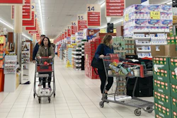 People shop at a grocery store in Buffalo Grove, Ill., March 19, 2023.