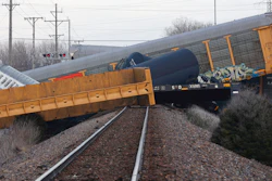 Multiple cars of a Norfolk Southern train lie toppled after derailing at a train crossing with Ohio 41 in Clark County, Ohio, Saturday, March 4, 2023.