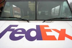 A FedEx truck makes deliveries in Mount Lebanon, Pa., Jan. 23, 2023.