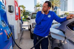 A driver puts fuel in his vehicle in Sunny Isles Beach, Fla., April 18, 2023.