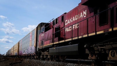 Canadian Pacific trains sit at the main CP Rail train yard in Toronto, March 21, 2022.