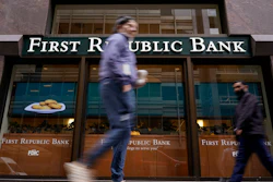 Pedestrians walk past the headquarters of First Republic Bank in San Francisco, May 1, 2023.