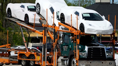 Corvettes are delivered to a Chevrolet dealership in Wheeling, Ill., May 9, 2023.