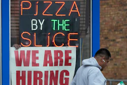 A hiring sign displayed at a restaurant in Prospect Heights, Ill., April 4, 2023.