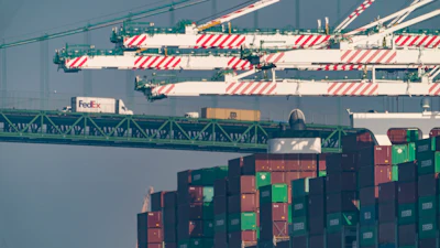 The Vincent Thomas Bridge over the Evergreen terminal at the Port of Los Angeles, San Pedro, Calif., Nov. 30, 2021.