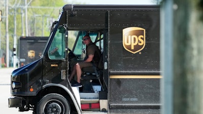 A UPS truck makes deliveries in Northbrook, Ill., May 10, 2023.