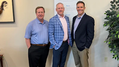 From left, Andy Waring, Sonepar central region president, Mike Dumas, president of Crawford Electric, and Tyler Mitchell, president of Irby Electric.
