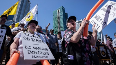 Striking port workers from the International Longshore and Warehouse Union Canada at a rally in Vancouver, July 9, 2023.