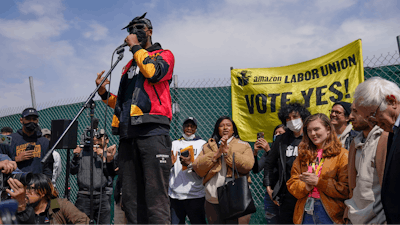 Christian Smalls, president of the Amazon Labor Union, speaks at a rally outside an Amazon facility on Staten Island in New York, Sunday, April 24, 2022.