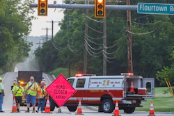 Barren Hill Fire Police block an intersection after a train derailment, July 17, 2023.