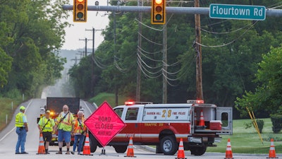 Barren Hill Fire Police block an intersection after a train derailment, July 17, 2023.