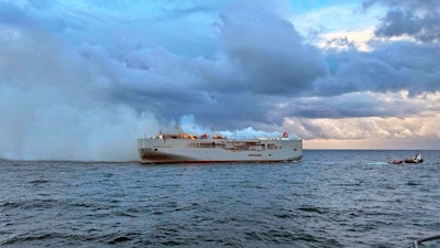 Smoke and flames on a freight ship in the North Sea off the Dutch island of Ameland, July 26, 2023.