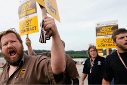 UPS teamsters and workers hold a rally, Friday, July 21, 2023, in Atlanta, as a national strike deadline nears.