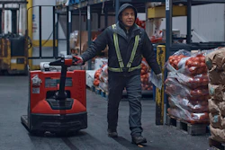 A man maneuvers a lift at S. Katzman Produce at the Hunts Point Produce Market, the Bronx, New York, Nov. 22, 2022.