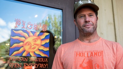 Co-owner Andy Parazette in front of Pica's Mexican Taqueria, Jackson, Wyo., Aug. 23, 2023.