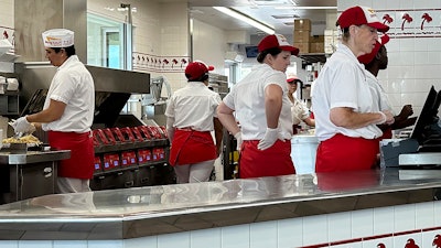 Workers at an In-N-Out restaurant, Thornton, Colo., Aug. 8, 2023.