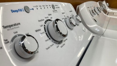 General Electric washing machines displayed at a store in Marietta, Ga., Sept. 15, 2023.