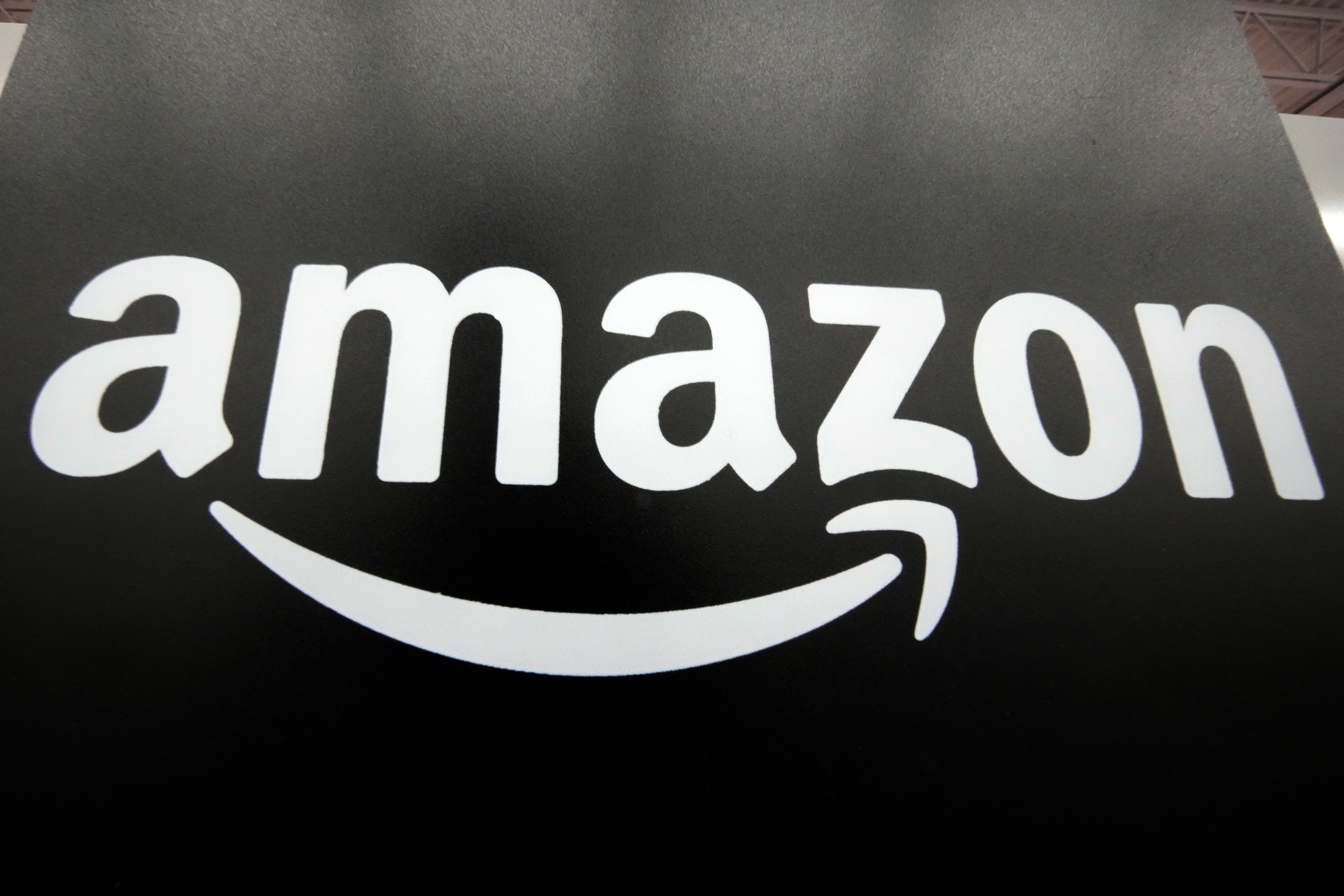 The Amazon logo is displayed at a Best Buy store in Pittsburgh on Jan. 23, 2023.