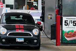 A vehicle is fueled at a gas station in Palatine, Ill., Wednesday, Nov. 8, 2023.