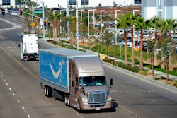 A semi-truck turns into an Amazon Fulfillment center in Eastvale, Calif. on Thursday, Nov. 12, 2020.