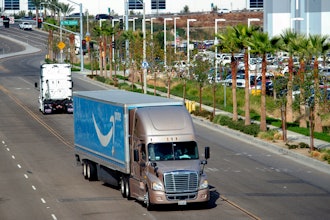 A semi-truck turns into an Amazon Fulfillment center in Eastvale, Calif. on Thursday, Nov. 12, 2020.