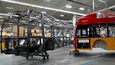Parts of electric busses at electric vehicle manufacturer New Flyer, Feb. 9, 2023, in St. Cloud, Minn.