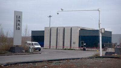 An SAIC Volkswagen plant is seen in the outskirts of Urumqi in northwestern China's Xinjiang Uyghur Autonomous Region, Thursday, April 22, 2021.