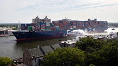 The container ship CMA CGM Marco Polo sails toward the Port of Savannah, May, 26, 2021.