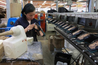 A woman works in a shoe factory, Leon, Mexico, Feb. 7, 2023.