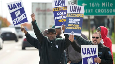 United Auto Workers members walk the picket line during a strike at the Stellantis Sterling Heights Assembly Plant, Sterling Heights, Mich., Oct. 23, 2023.