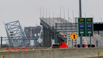 The wreckage of Francis Scott Key Bridge as seen from Dundalk, Md., March 27, 2024.