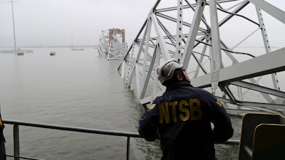 A National Transportation and Safety Board investigator on the cargo vessel Dali, Baltimore, March 27, 2024.