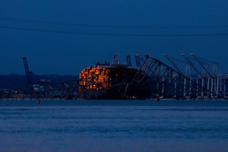 Wreckage of the Francis Scott Key Bridge rests on the container ship Dali, Baltimore, March 31, 2024.