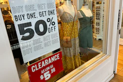 Signs in a clothing store in Lone Tree, Colo., April 29, 2024.
