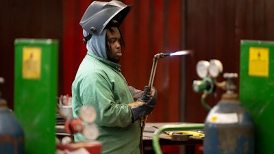 K'Jan Mason, a student at Hendry County Adult Learning, checks the torch prior to a welding project, March 14 ,2024.