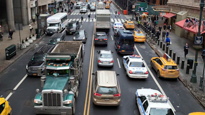 Traffic traverses 42nd Street near Grand Central Terminal, New York, Jan. 11, 2018.