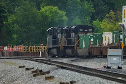 A Norfolk Southern freight train travels through East Palestine, Ohio, June 25, 2024.