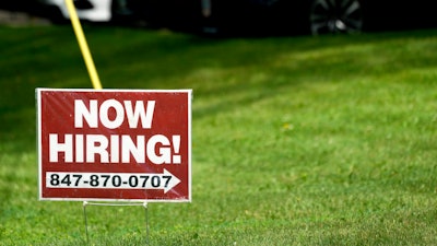 A hiring sign in Wheeling, Ill., July 10, 2024.