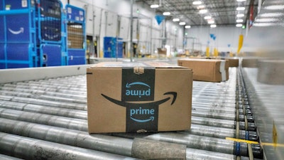 A package moves along a conveyor belt at an Amazon's DAX7 delivery station, South Gate, Calif., July 16, 2024.