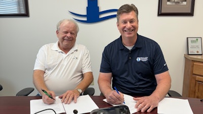 From left, Superior co-founder Chuck Gerlach and Great Lakes President Kevin Weidinger.
