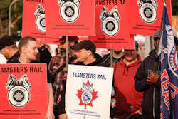 Teamsters Canada Rail Conference members picket outside the CPKC headquarters Calgary, Alta., Aug. 23, 2024.