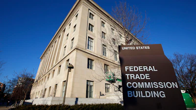 A sign stands outside the Federal Trade Commission building, Jan. 28, 2015, in Washington.