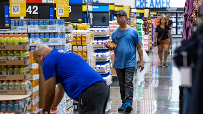 People shop at a Walmart Superstore in Secaucus, New Jersey, July 11, 2024.
