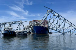 The fallen Francis Scott Key Bridge in Baltimore is pictured Sunday, March 31, 2024, where divers assisted crews with the complicated and meticulous operation of removing steel and concrete.