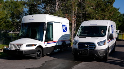 The U.S. Postal Service's next-generation delivery vehicle, left, in Kokomo, Ind., Aug. 29, 2024.